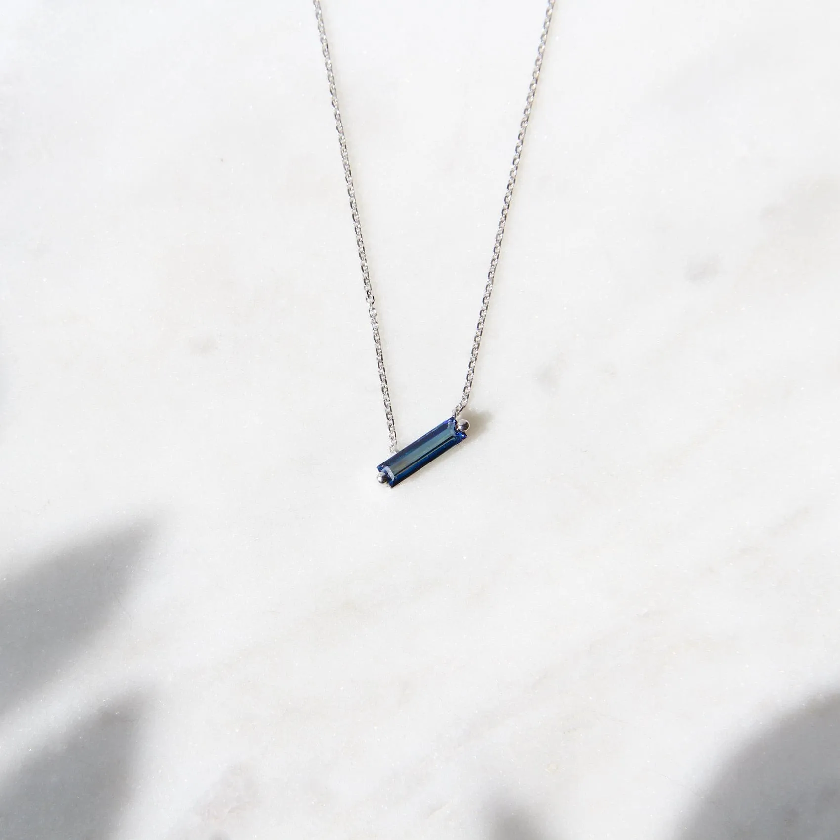 14k White Gold English Blue Topaz Baguette Necklace