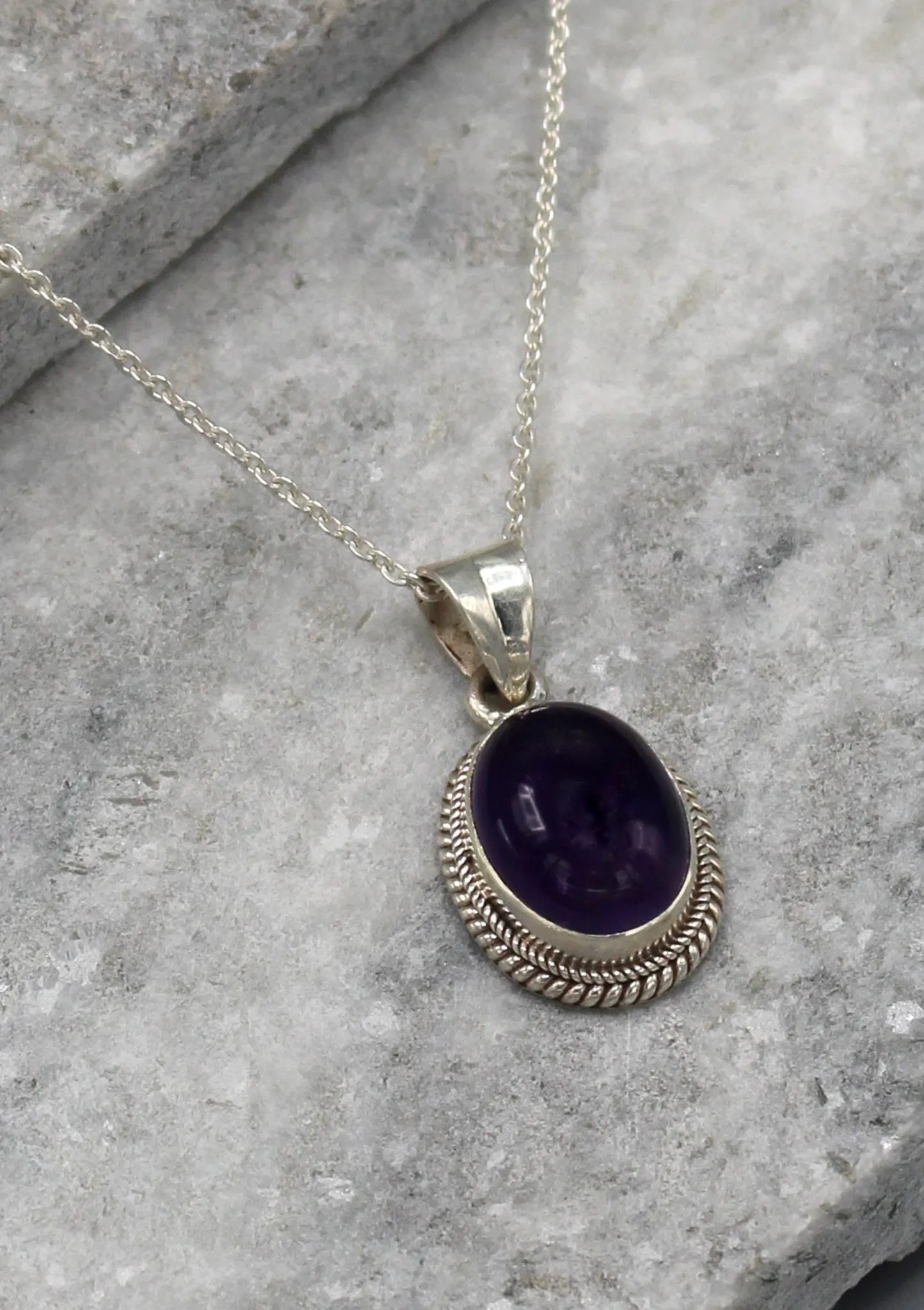 Charming Amethyst Inlaid Sterling Silver Pendant