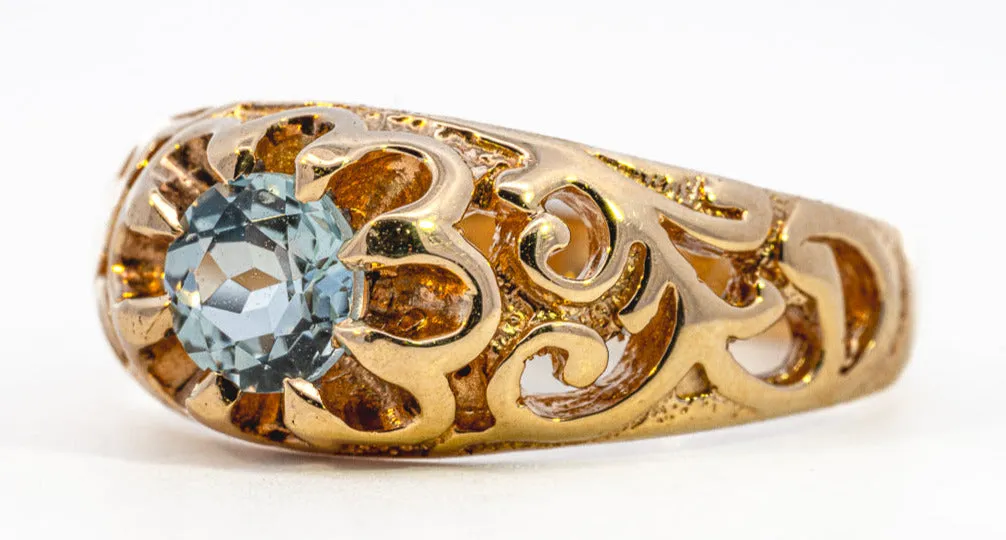 Elegant Yellow Gold and Light Blue Topaz Ring Golden Treasure